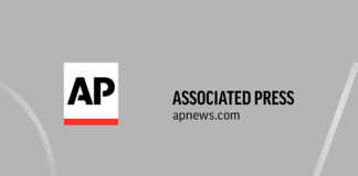 Former school superintendent alleges anti-gay discrimination – Associated Press