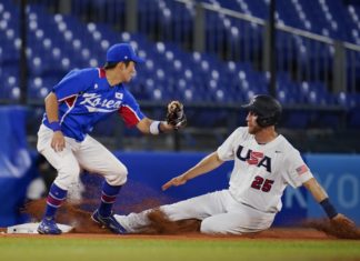 Texans In Tokyo: Shot-Putter Breaks Olympic Record, Wins Gold; Men’s Basketball Finals Set & More – KERA News