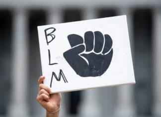 Bishop strips Mass. school of ‘Catholic’ designation for displaying BLM and gay pride flags – TheGrio