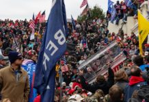 Rioter who brought gun to Capitol gets longest Jan. 6 prison sentence – Axios