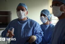 Hundreds of NHS quangos to be scrapped in 10-year health strategy - BBC