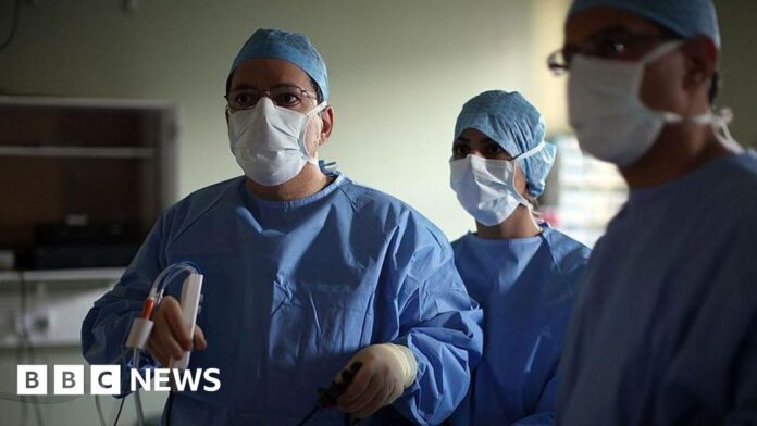 Hundreds of NHS quangos to be scrapped in 10-year health strategy - BBC