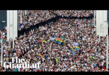 Tens of thousands march against Hungary's government for LGBT rights – video - The Guardian
