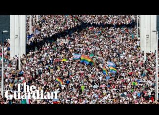 Tens of thousands march against Hungary’s government for LGBT rights – video – The Guardian Tens of thousands march against Hungary's government for LGBT rights – video - The Guardian