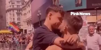 Gay influencers share passionate kiss in front of anti-LGBTQ+ protesters at Pride in London - PinkNews