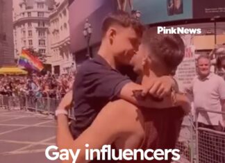 Gay influencers share passionate kiss in front of anti-LGBTQ+ protesters at Pride in London - PinkNews
