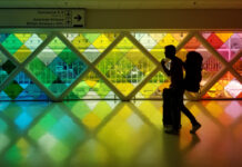 WATCH: This super gay airport has a sauna, drag performances & the fiercest runway entrance - Queerty