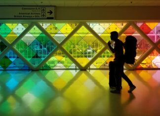 WATCH: This super gay airport has a sauna, drag performances & the fiercest runway entrance - Queerty