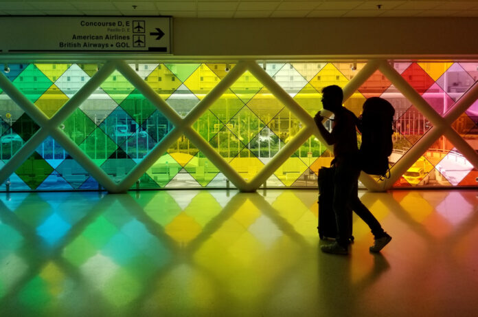 WATCH: This super gay airport has a sauna, drag performances & the fiercest runway entrance - Queerty