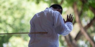 2 men publicly caned for hugging and kissing in Indonesia - CBS News