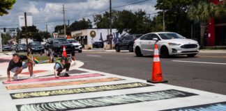 Activists redecorate Florida’s commemorative LGBT crosswalk after it was removed - The Independent