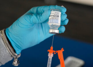 F.D.A. Approves Covid Shots With New Restrictions - The New York Times