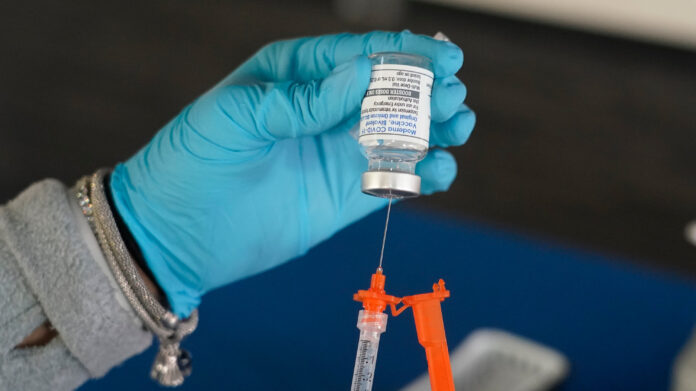 F.D.A. Approves Covid Shots With New Restrictions - The New York Times