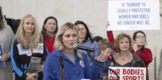 Virginia health board moves to ban trans women from women's sports - Axios