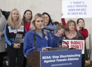 Virginia health board moves to ban trans women from women's sports - Axios