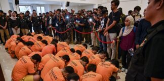 34 men arrested for gay sex & then paraded through the street in Indonesian raid - LGBTQ Nation