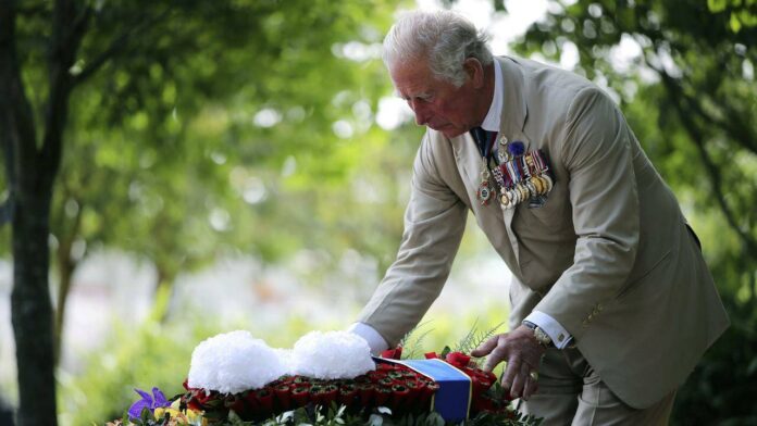 King Charles lays flowers at national memorial to LGBT armed forces veterans - The Guardian