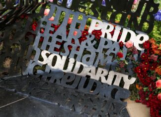 King Charles unveils UK's first LGBT armed forces memorial - Reuters